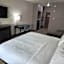Grander Inn & Suites by IHG