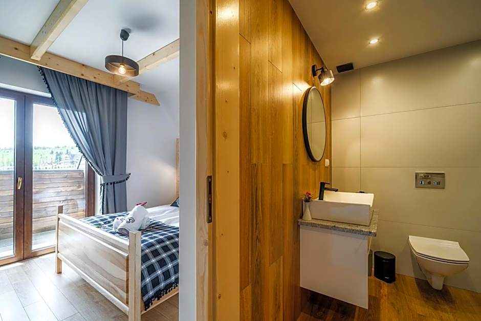 Aparthotel Rabiań-SKI 10metrów do wyciagu połączonego z całą Kotelnicą na miejscu wypoożyczalnia z serwisem