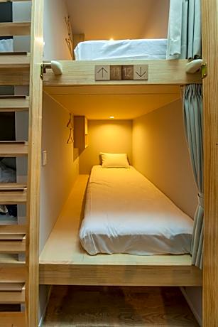 Single Bed in Dormitory Room