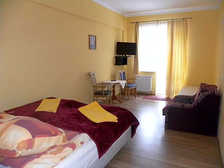 Okulski Grand Rozewie Pokoje i Apartamenty