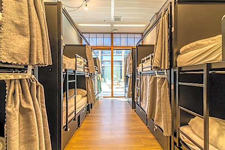 Bed in 12-bed Women Dormitory Room