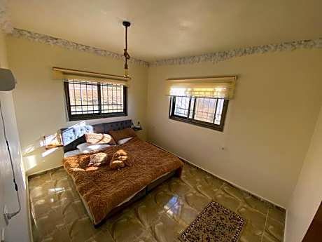 Queen Room with Shared Bathroom