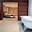 Cowrie Shell Beach Apartments Official