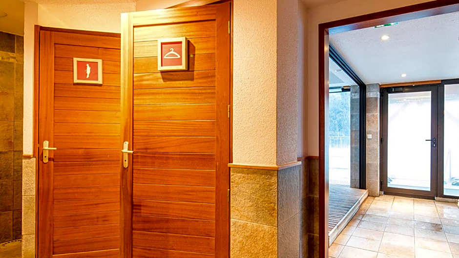 Vacancéole - Résidence Les Chalets de la Ramoure