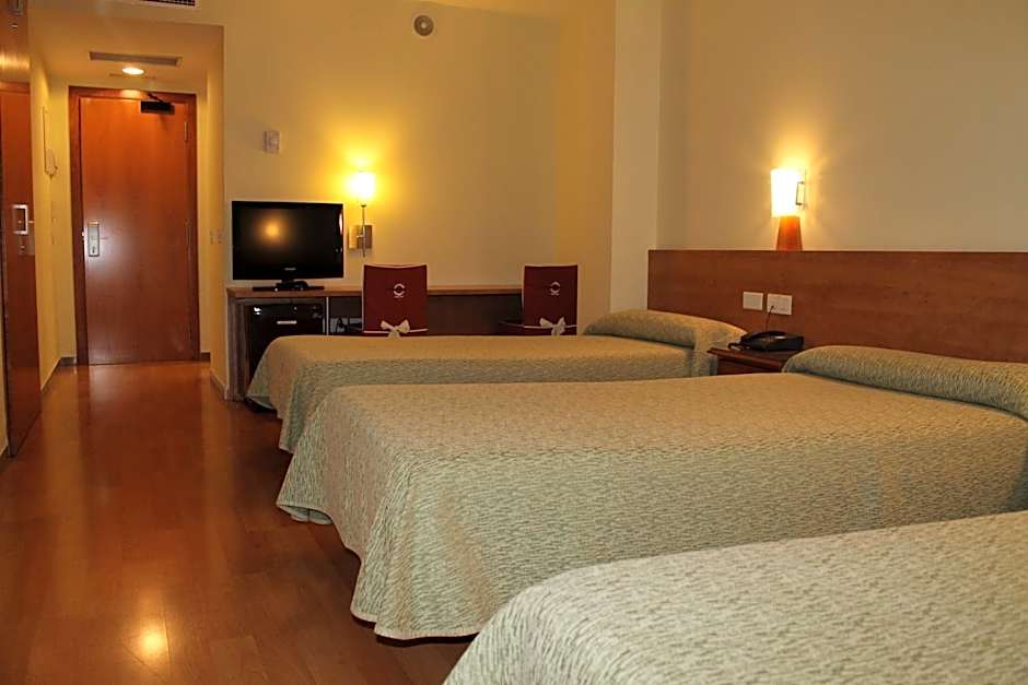 Photo 1 of 5 of Triple Room