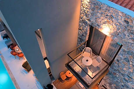 Luxury Suite with Balcony and Pool View