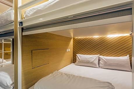 Double bed in Male Dormitory room