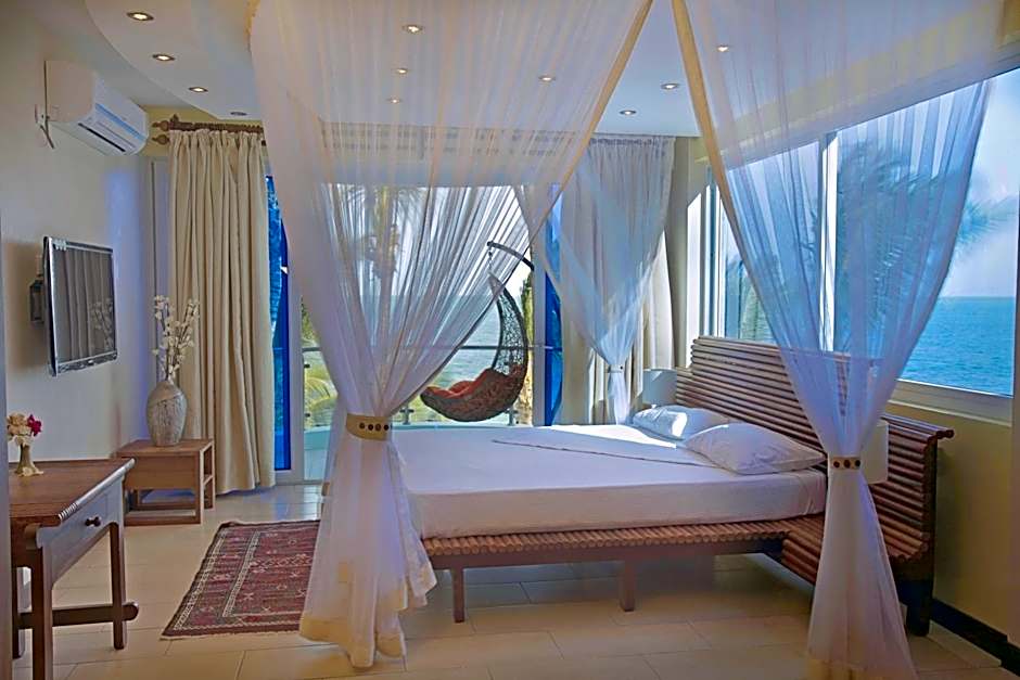 Cowrie Shell Beach Apartments Official