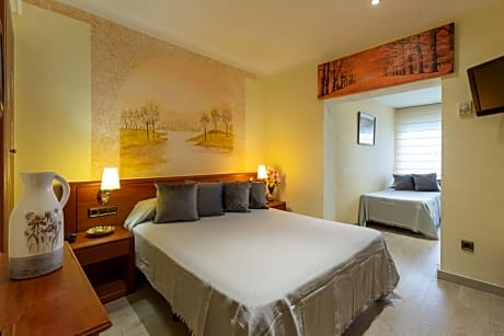 Triple Room (2 Adults + 1 Child) with parking included