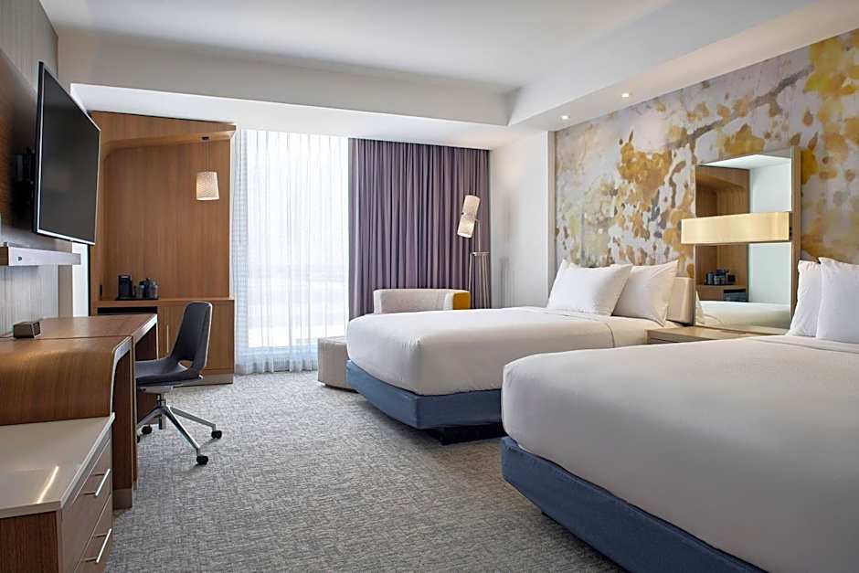 Photo 1 of 3 of Standard 2 Queen Beds Guestroom, City View