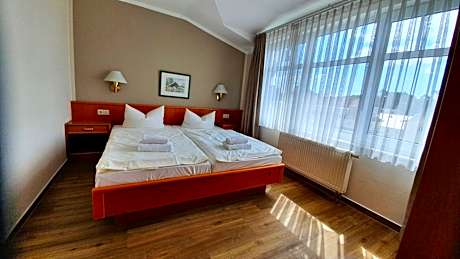 Two-Bedroom Studio with Balcony