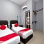 OYO 89436 SZA Inn