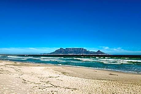 Beachfront beauty endless sea and mountain views