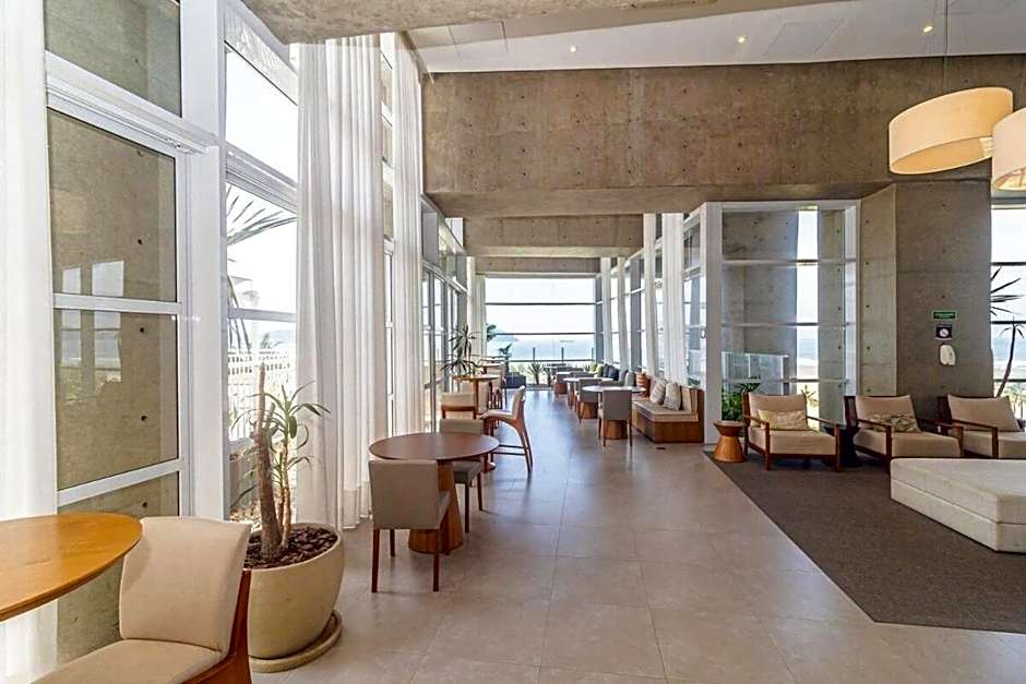 Studio moderno em condomínio de luxo pé na areia