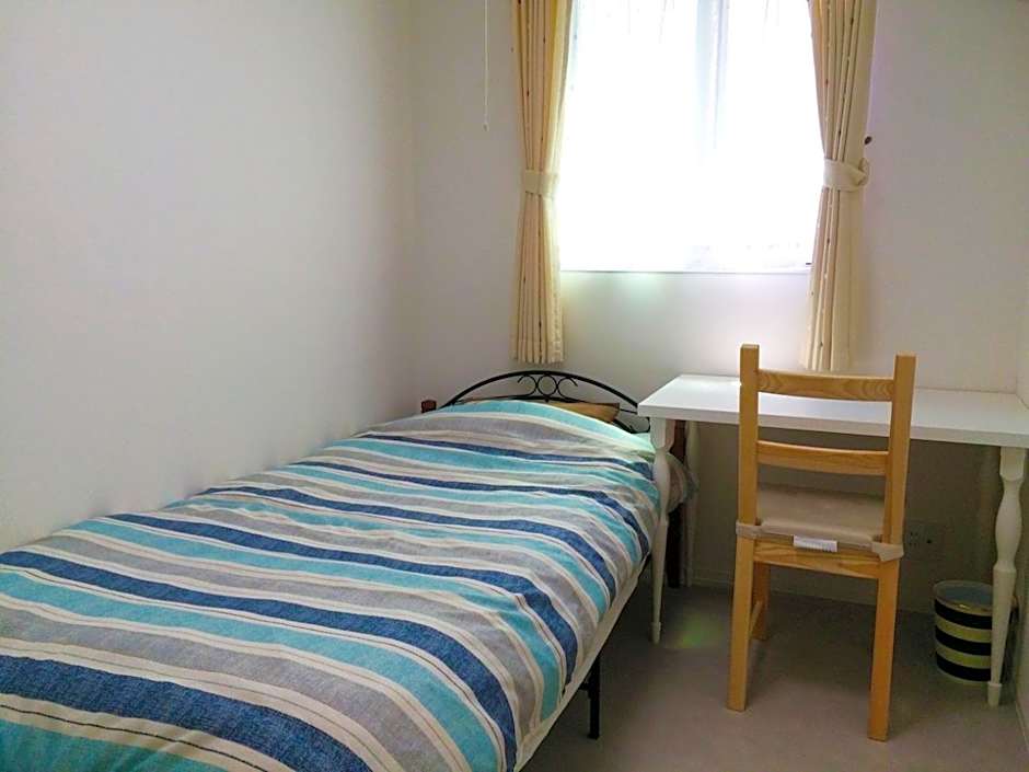 Photo 1 of 2 of Standard Single Room with Shared Bathroom - Room Only