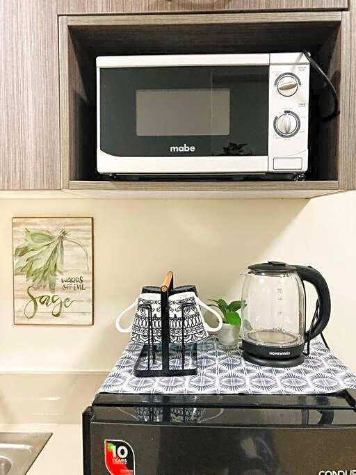 Santorini Inspired 1bedroom Unit at Trees Residences