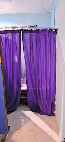 Single Bed in Dormitory Room