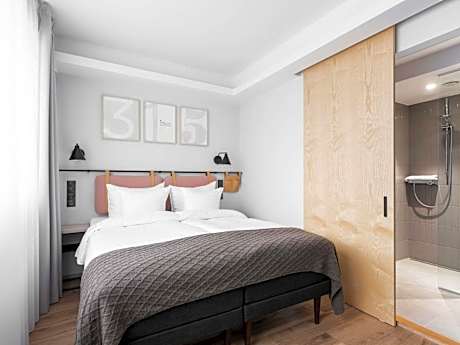 Junior Suite with One Double Bed, Sofa and Sauna