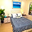 Tropical Beach Condo - Pool, Shops, 86" TV, WiFi
