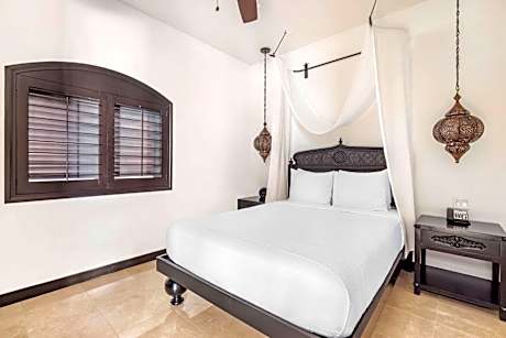 Two Bedroom Suite with Partial Pool View and Balcony