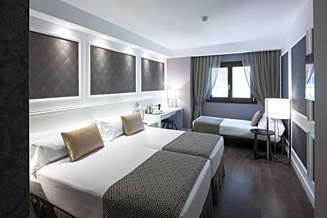 Triple Room (2 Adults + 1 Child)