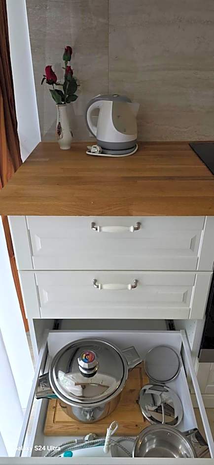 Apartamentai šalia baseino