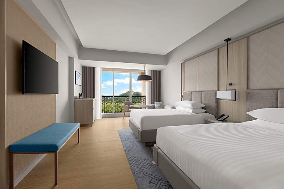 Photo 1 of 4 of Deluxe Multiple Beds Guestroom, Pool View