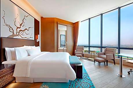 Deluxe Suite with 20% F&B Discount, Happy Hours (1 + 1 IMFL - 4 pm to 8 pm at 31/32) & 2 Way Airport Transfers