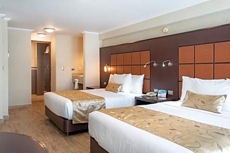 Quadruple Room with Two Queen Beds and No View - Non Smoking/Interior Hall