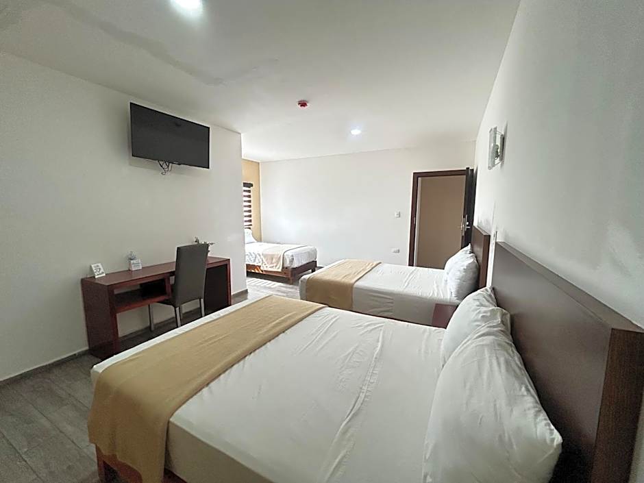 Photo 1 of 7 of Triple Room