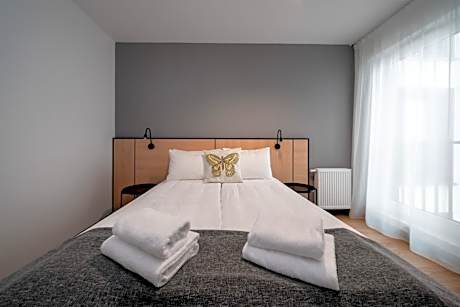 Executive Room with One Queen Bed and One Sofa Bed