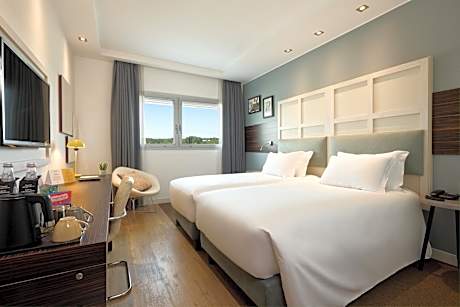 Standard Room with One Queen Bed and Two Single Beds
