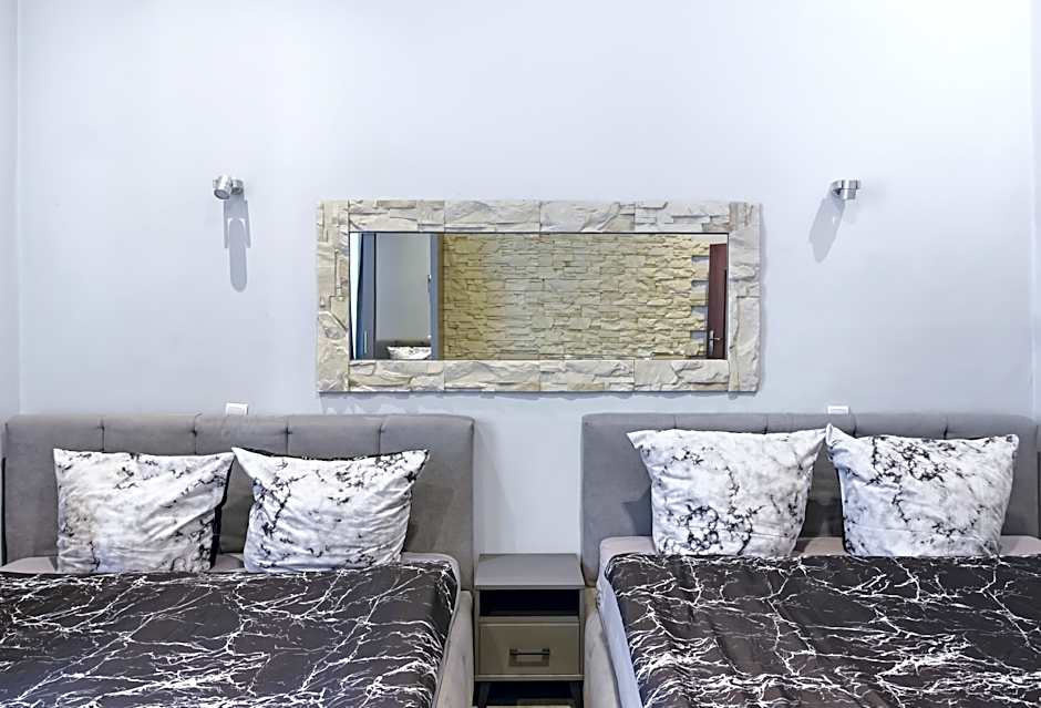 Queen Apartments