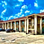Magnolia Inn And Suites