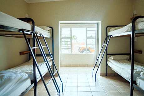 Single Bed in Dormitory Room