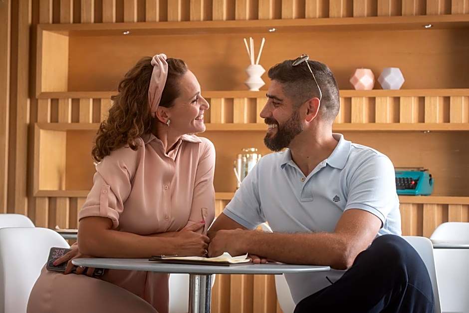 Essence Inn Marianos Hotel