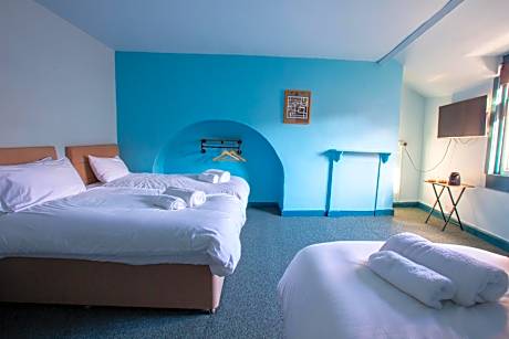 Quadruple Room with Shared Bathroom