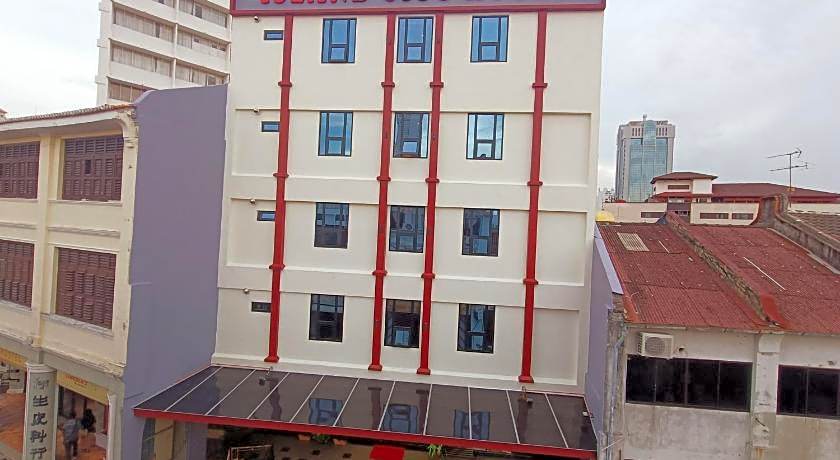 Capital O 90897 Island City Hotel