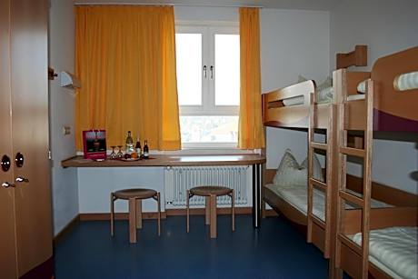 Single Bed in Female Dormitory Room