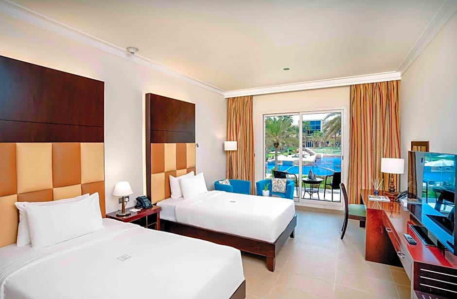 Photo 1 of 11 of Deluxe 1 King Bed, Pool View