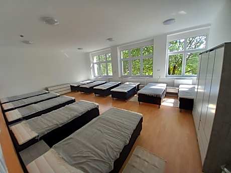 Single Bed in Dormitory Room