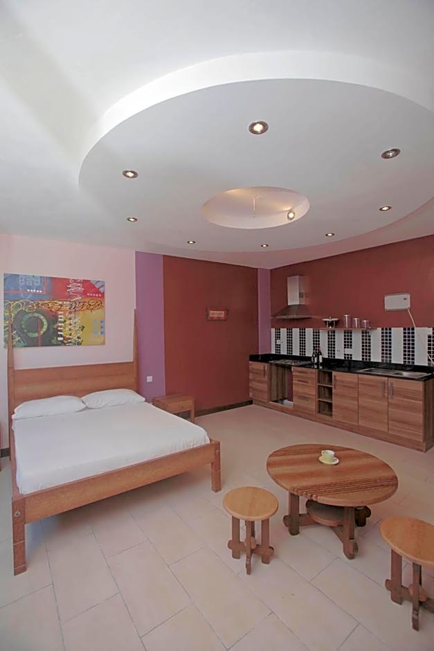 Cowrie Shell Beach Apartments Official