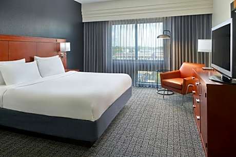 King Room with Sofa Bed and Roll-in Shower - Mobility and Hearing Accessible