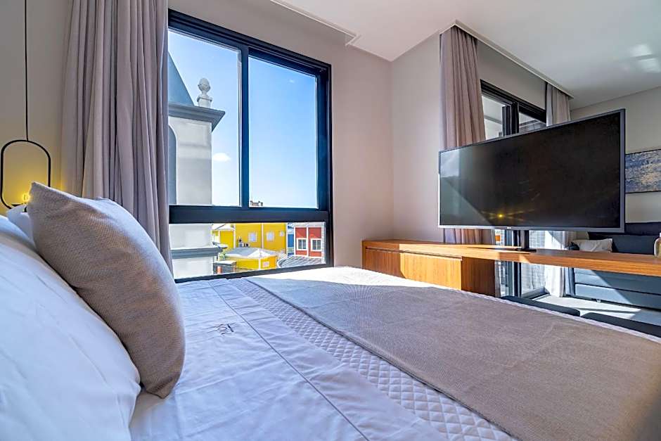 AION suítes 102 - Compacto e luxuoso Loft - Rooftop com piscina e academia - À poucos passos da praia