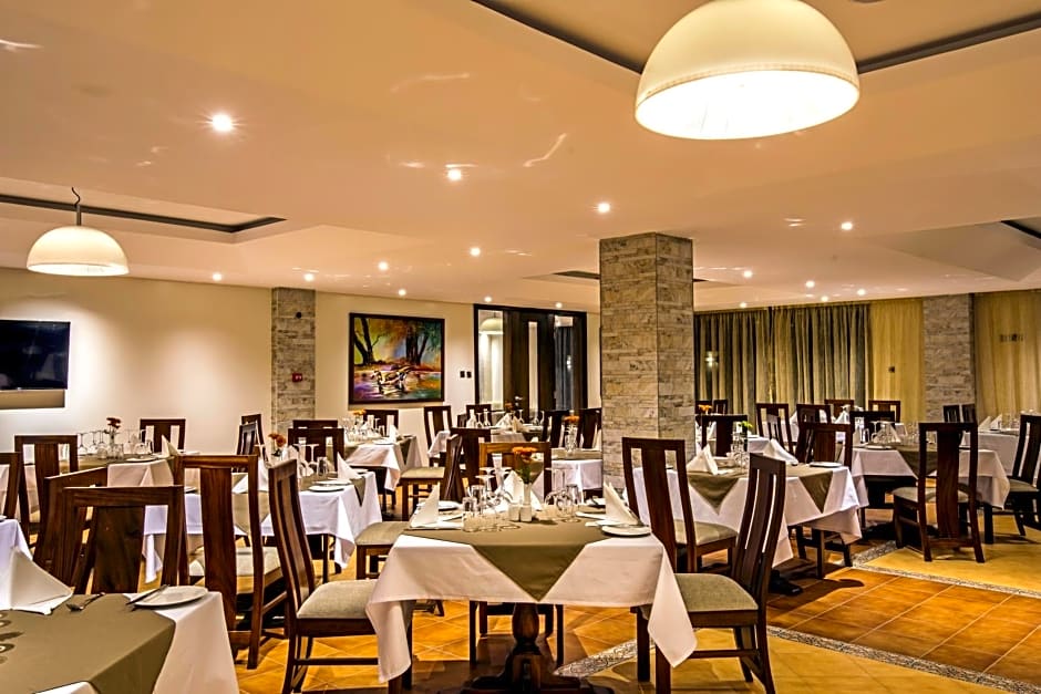 Magna Hotel and Suites