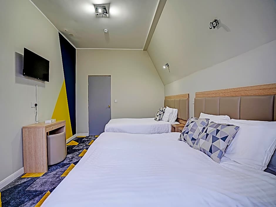 Photo 1 of 6 of Standard Family Triple Room