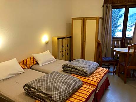 Economy Quadruple Room with Shared Bathroom