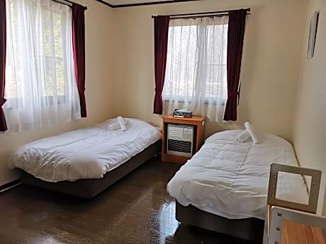 Double and 2 Single Beds with Shared Bathroom