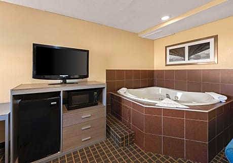 suite-1 king bed, non-smoking, jacuzzi, microwave and refrigerator, high speed internet access, full breakfast