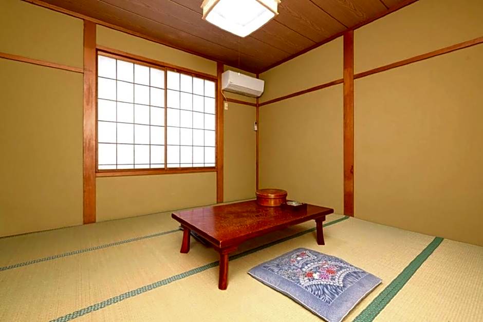 Photo 1 of 5 of Basic Triple Room with Shared Bathroom